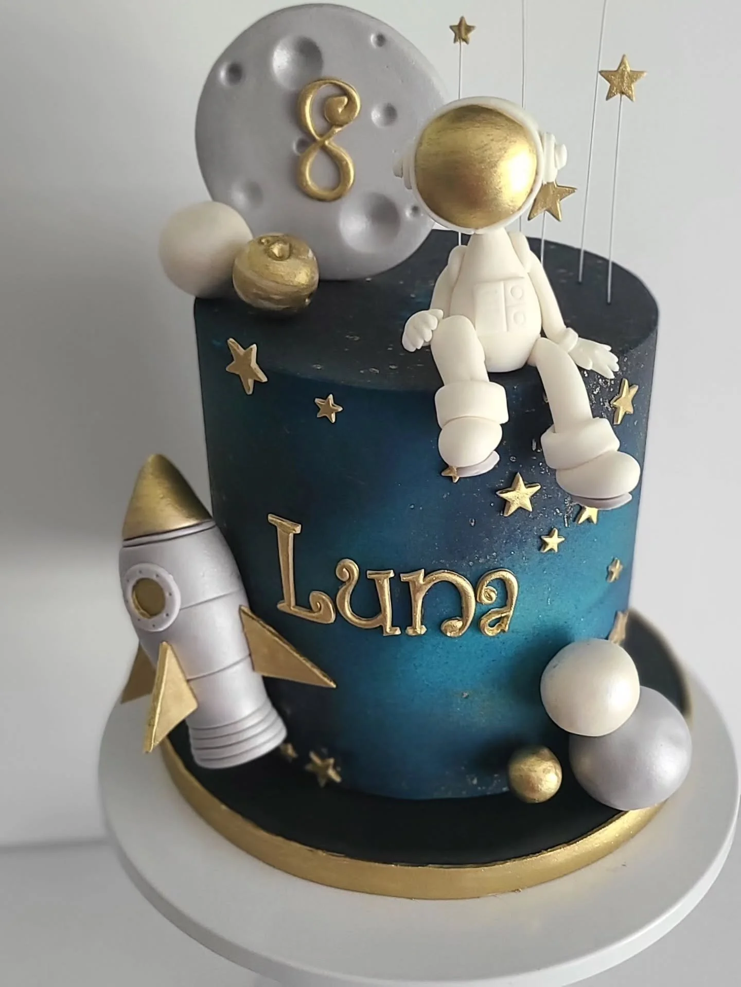 I love you to the Luna and back! #spacethemecake #astronaut #spacetheme #SaraHallCake #customcake