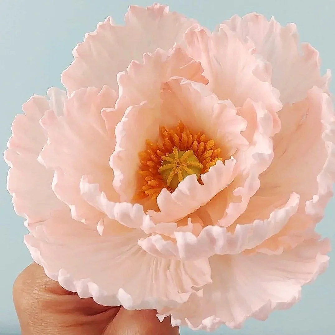 Handmade, non-edible sugar flowers and custom cake toppers for bakeries, florists, and event pros. Made in Massachusetts and shipped nationwid