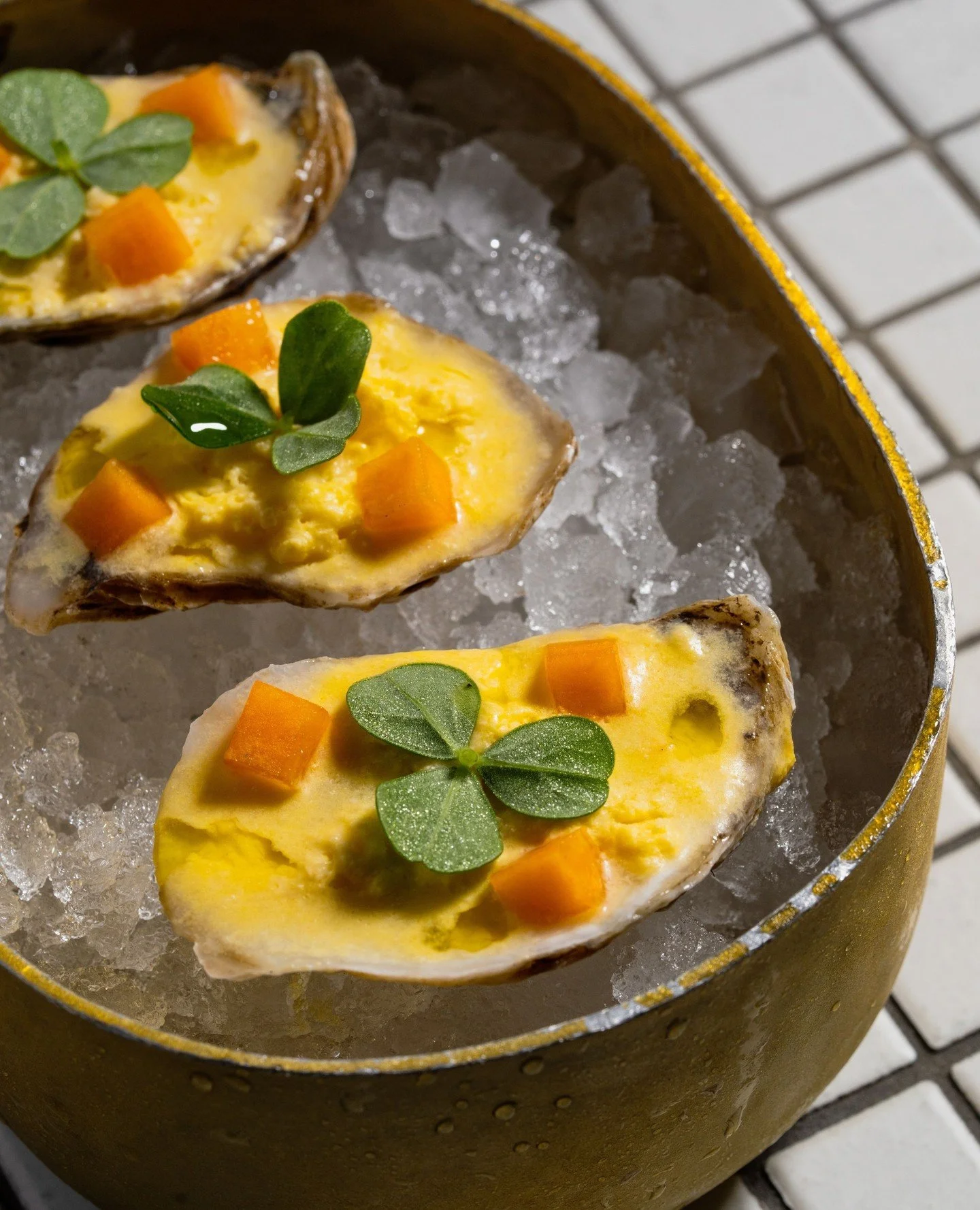 Oysters. Sugar cube melon. Green apple sorrel.