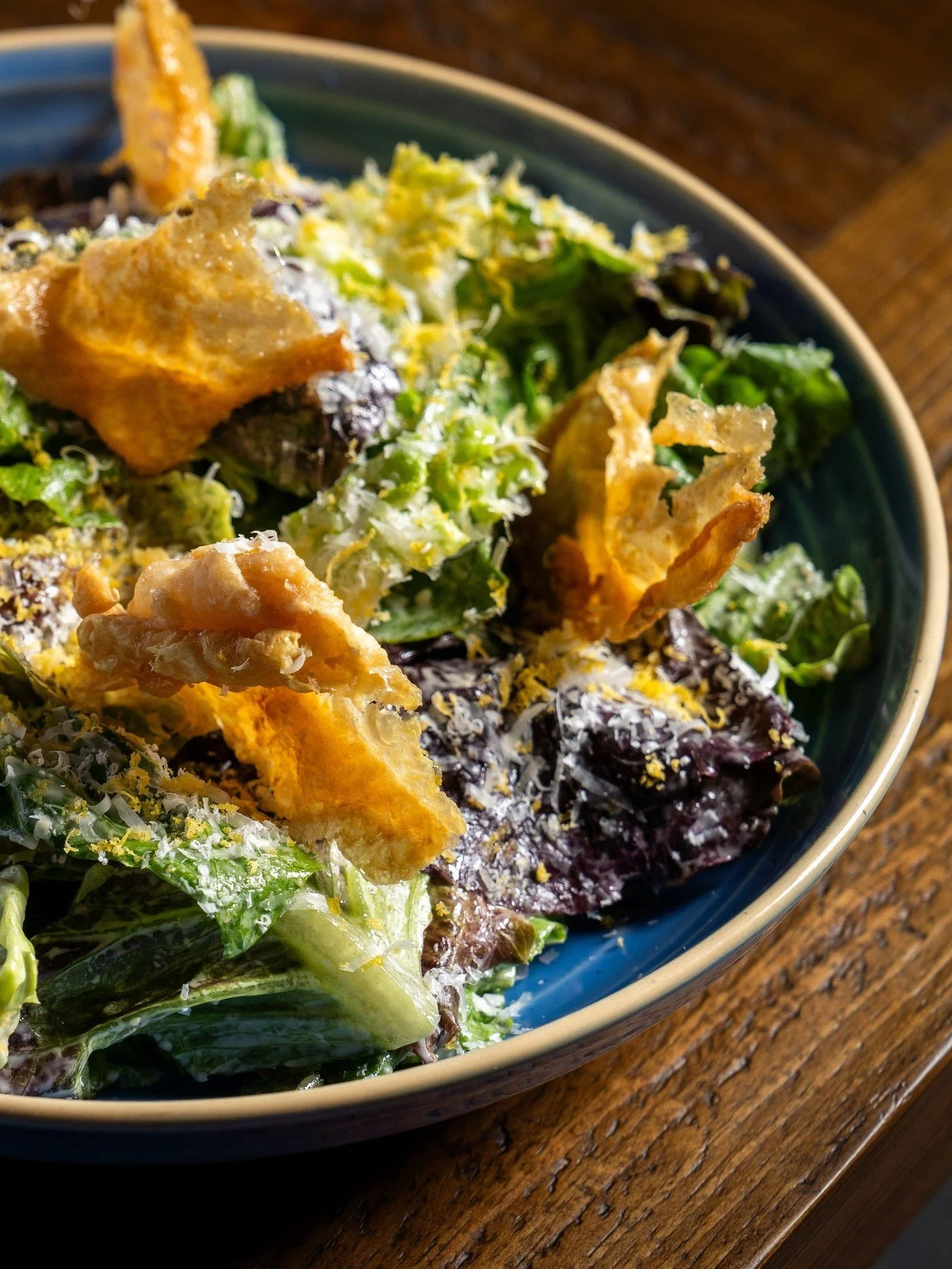 Croutons had a good run. But once you've had crispy chicken skin on your Caesar, there's really no going back. Ours is finished with cured egg yolk, boquerones, and pecorino romano.