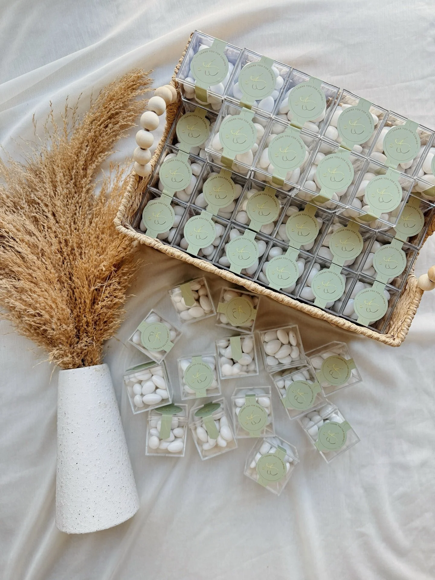 | Over a hundred little thank-yous, each one curated with care for our client’s milestone celebration. 
 
Design, sourcing, and packaging all handled by Wrynne. 
 
Soft tones and clean details, designed to echo the e