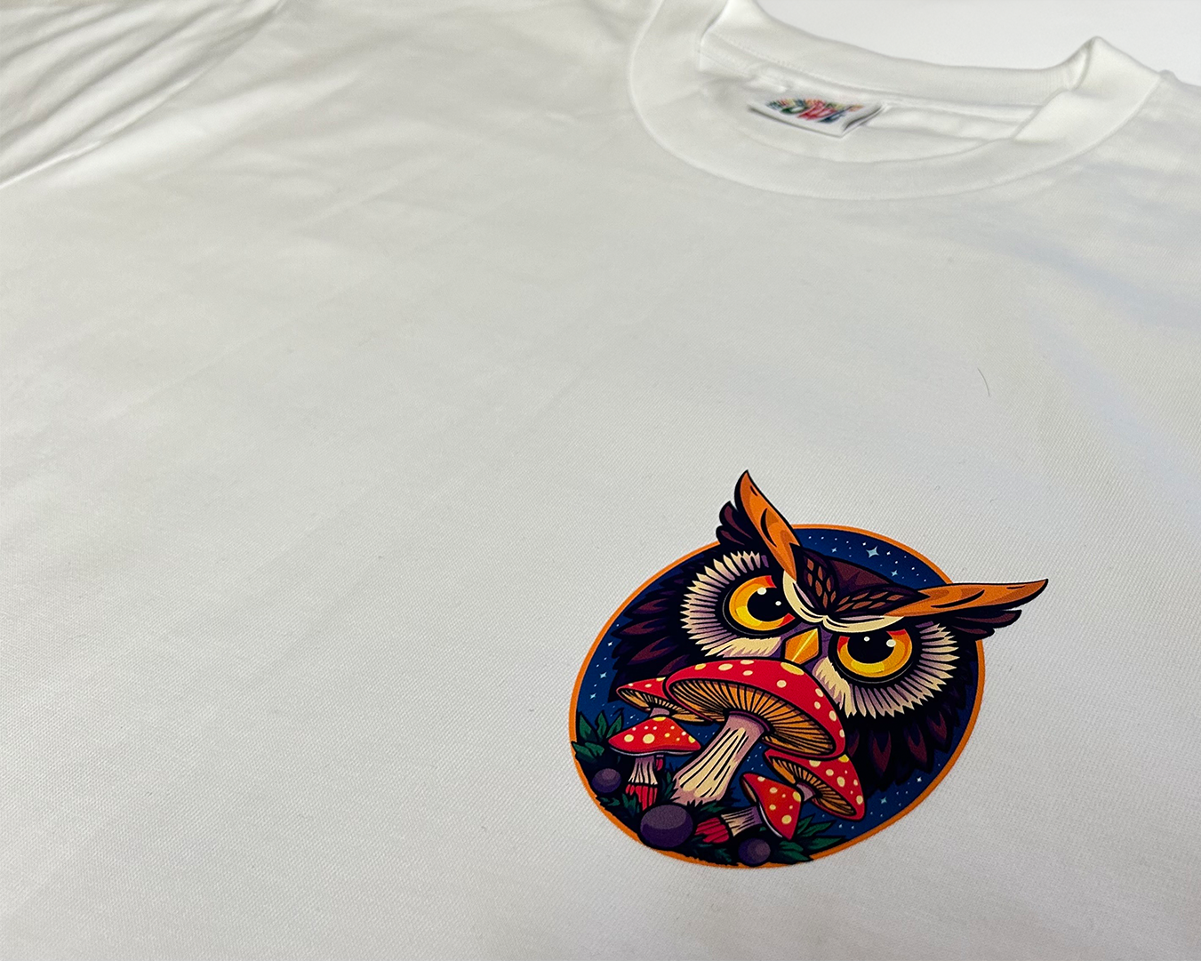 White Psychedelic Owl Everyday T-shirt featuring a minimalist owl design – comfortable, unisex fit perfect for daily wear.