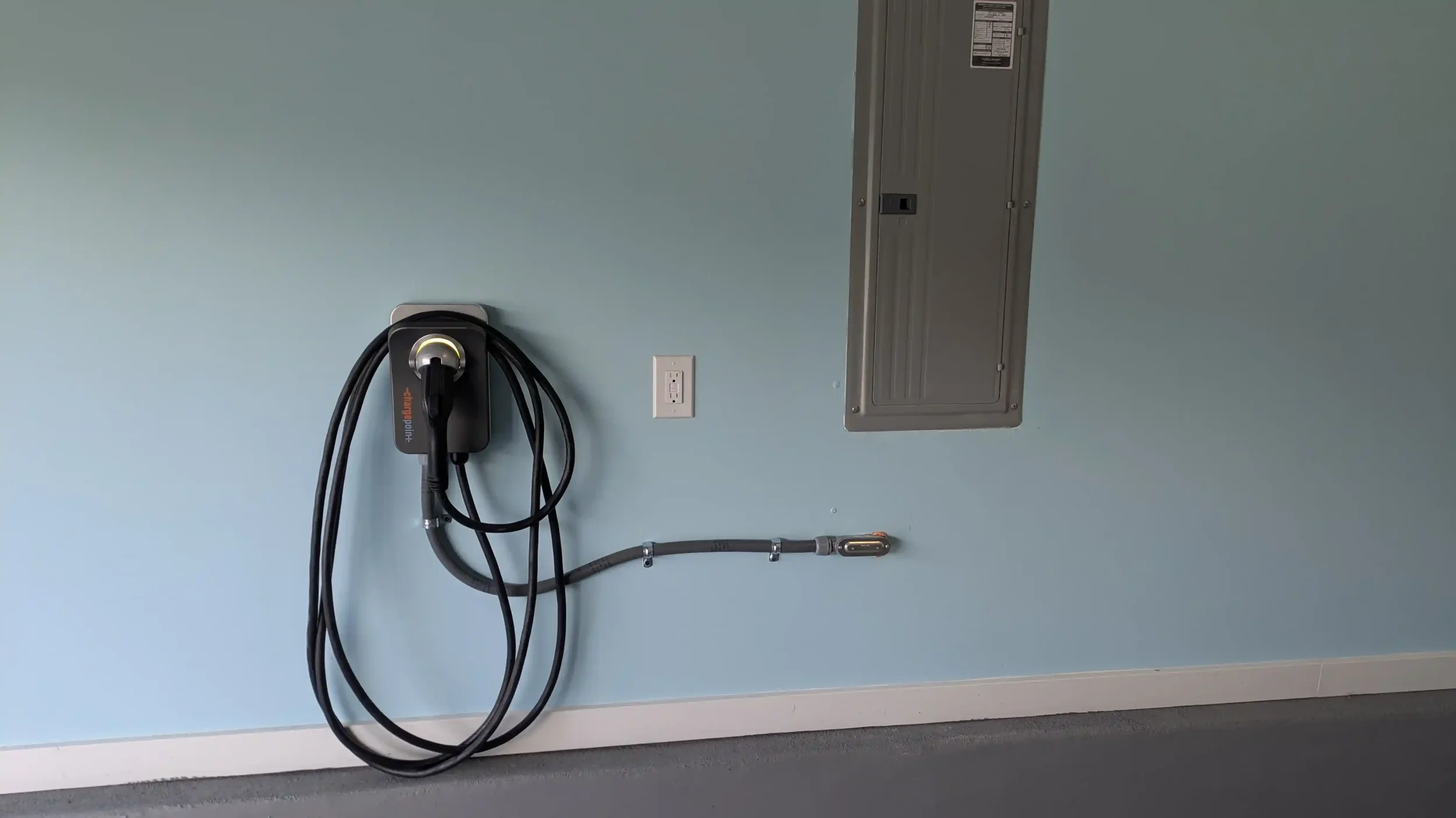 WaveRider Electric & Automation EV charger installation in a garage in Riverlights Wilmington NC