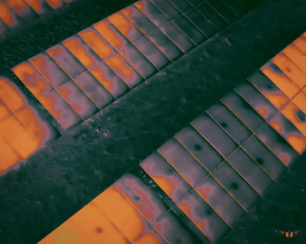 Close-up of a stack of solar panels .