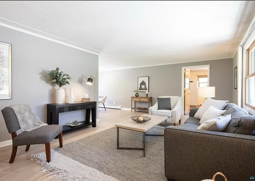 Listed for $449,900 &bull; Sold for $476,500

This sweet Hermantown home sold for well over asking, and our *soft* staging played a quiet but powerful role.

With soft staging, we bring in carefully selected accessories, textiles, and artwork to comp