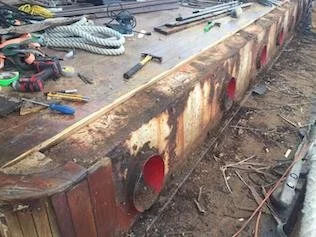 Removing woodwork to get at the rust