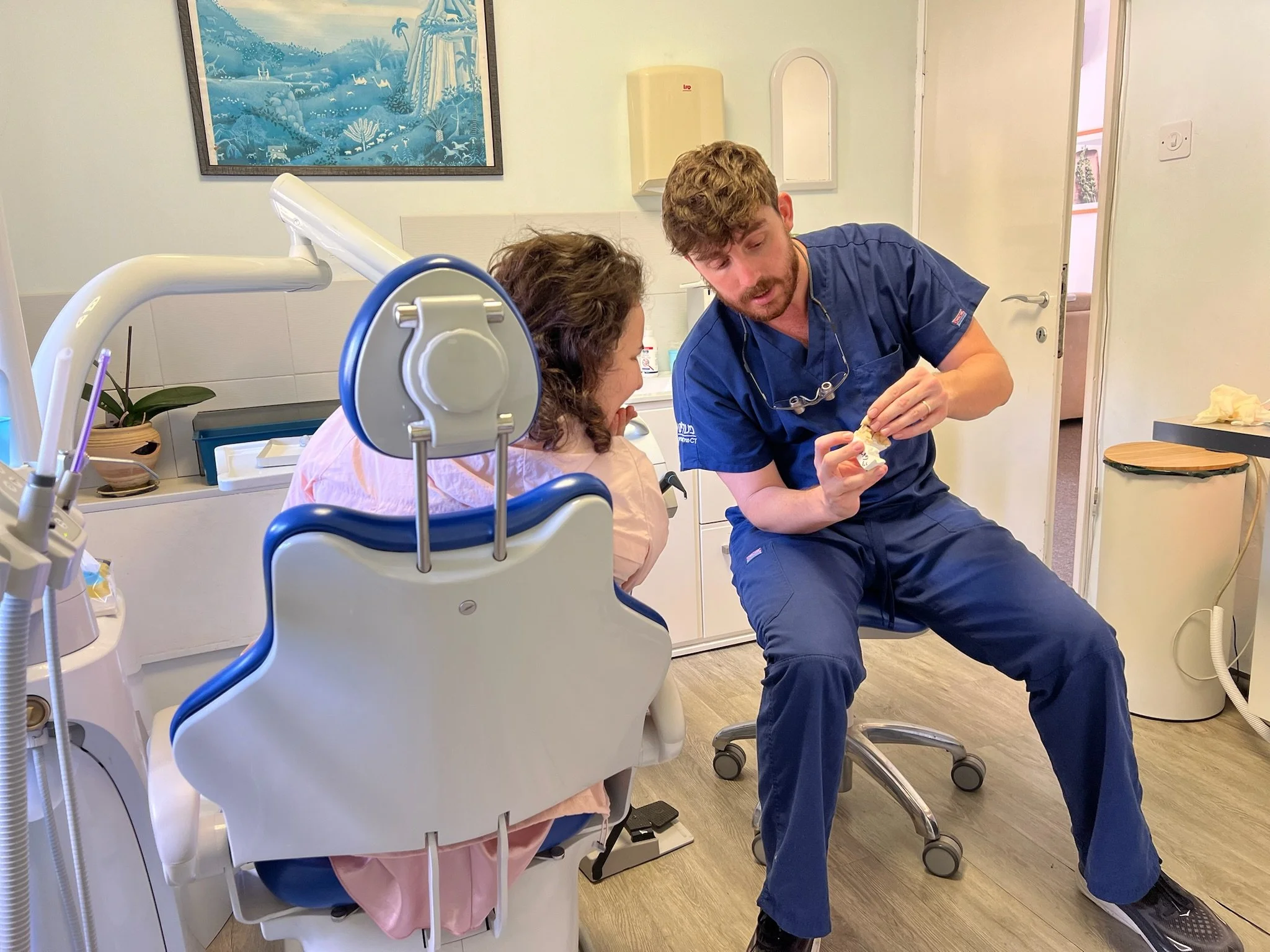 American dentist Dr. Yoash Permut in his dental office in Haifa for English-speaking patients