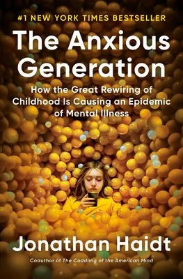 Cover of the book 'The Anxious Generation' by Jonathan Haidt with a child surrounded by yellow balls.