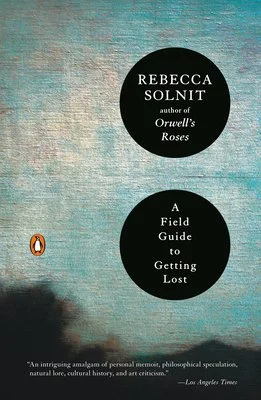 Cover of the book 'A Field Guide to Getting Lost' by Rebecca Solnit, featuring abstract artwork with blue and orange hues and the Penguin logo.