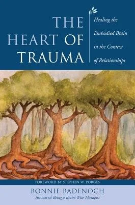 Cover of the book 'The Heart of Trauma' by Bonnie Badenoch, featuring an illustration of tree roots and branches, with a subtitle focusing on healing in relationships.