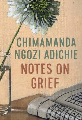 Book cover of 'Notes on Grief' by Chimamanda Ngozi Adichie featuring a flower in a vase and a folded newspaper.