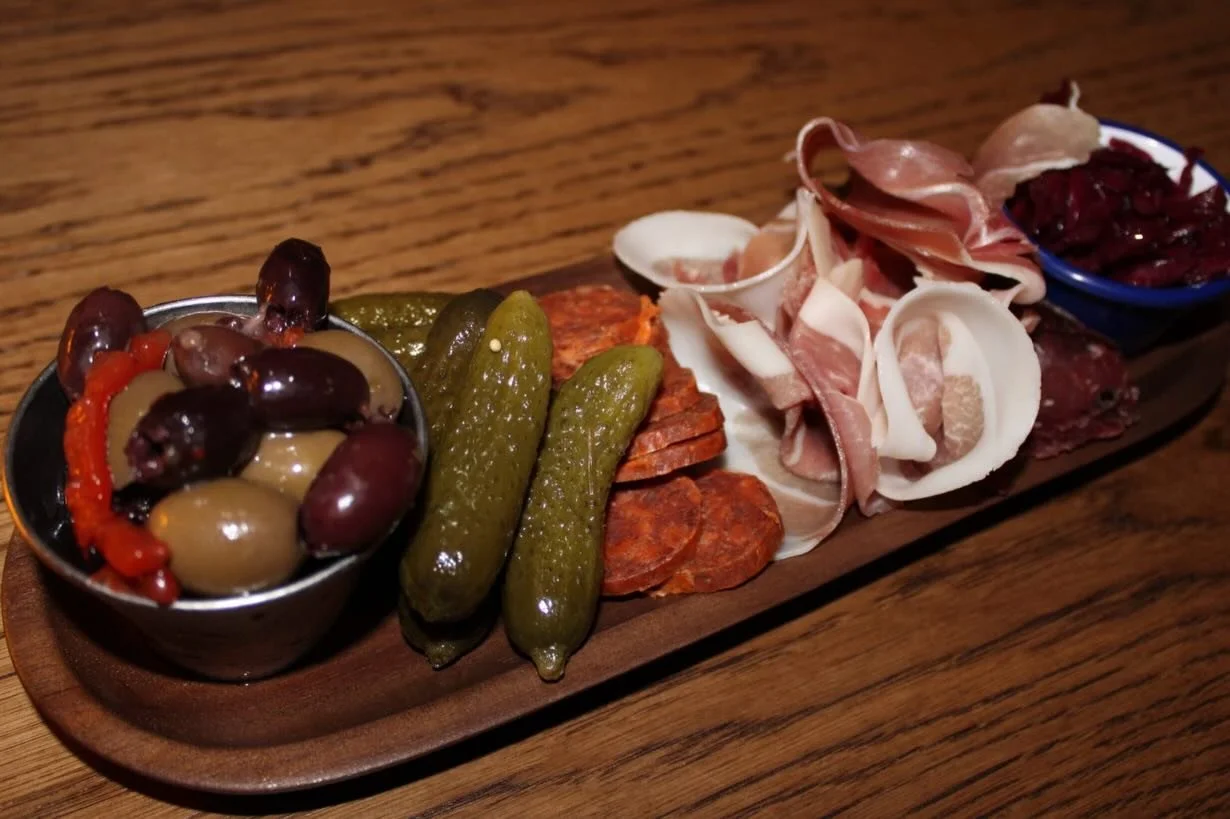 We figured enough time has passed since the Christmas holidays to post some food&hellip;

Our charcuterie board boasts a great selection of carefully selected meats, accompanied by olives, cornichons and pickled slaw, making a perfect grazing snack w