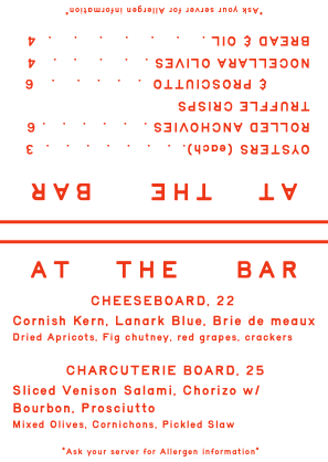 Menu listing in red text with food items including cheese board, charcuterie board, and egg platters, along with some wine options.