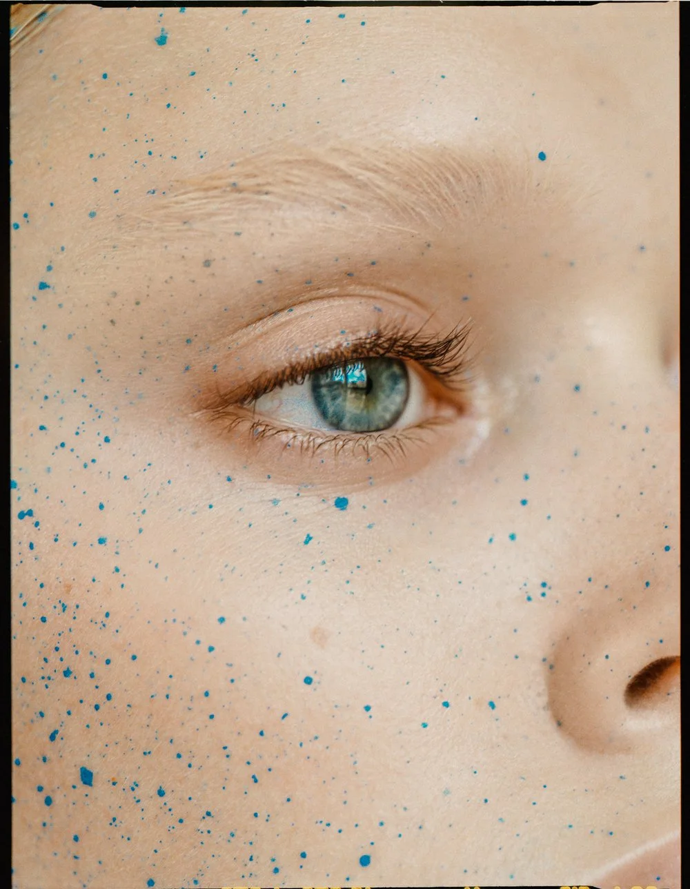 macro beauty blue freckles