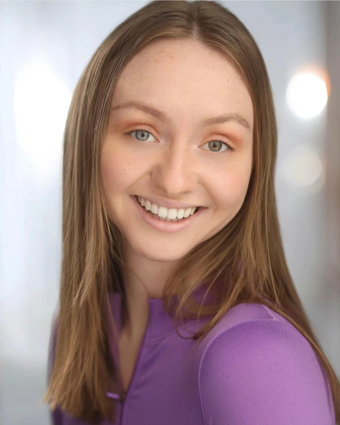 Photo of a woman with long, brown hair