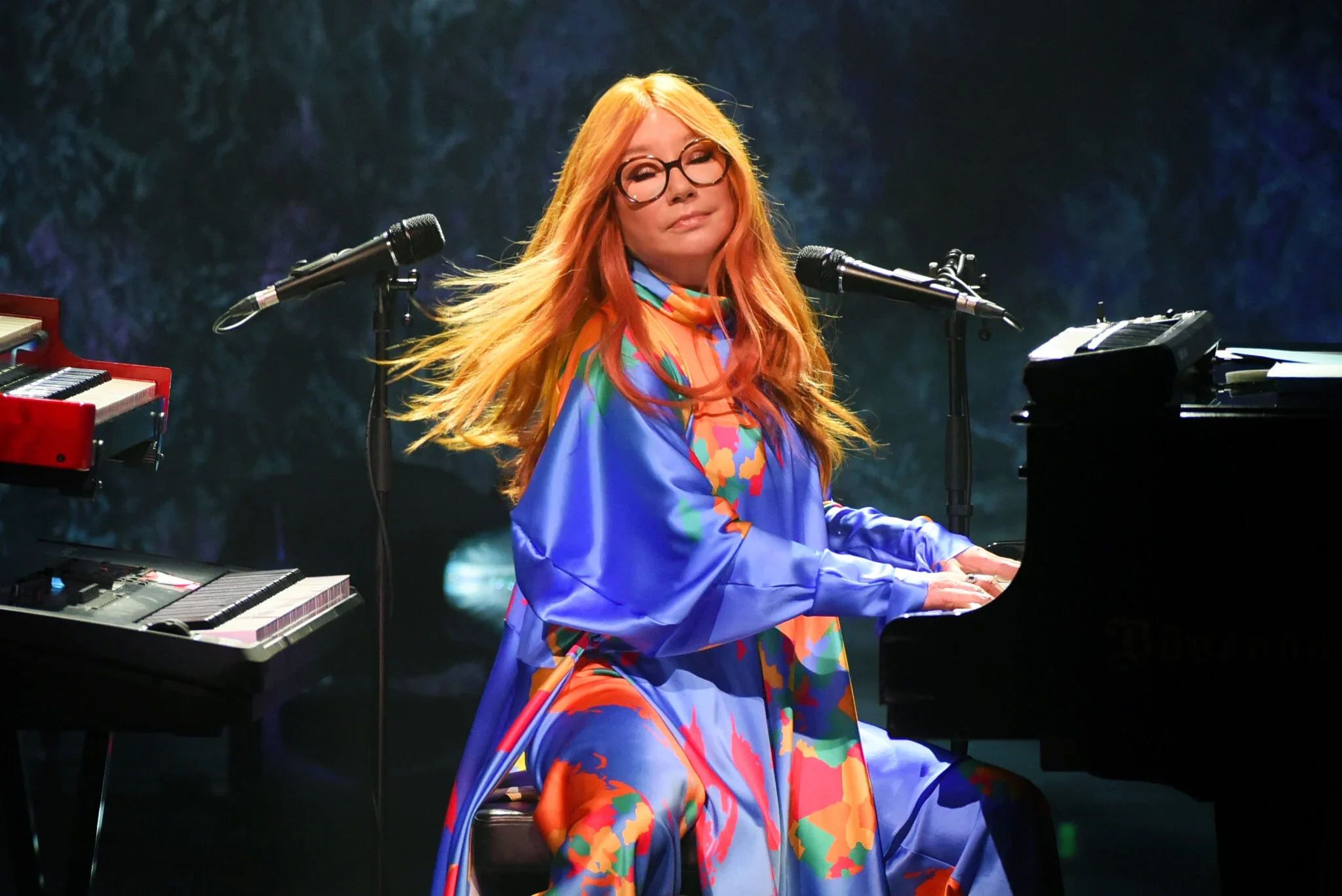 Tori Amos on tour, playing two keyboards live