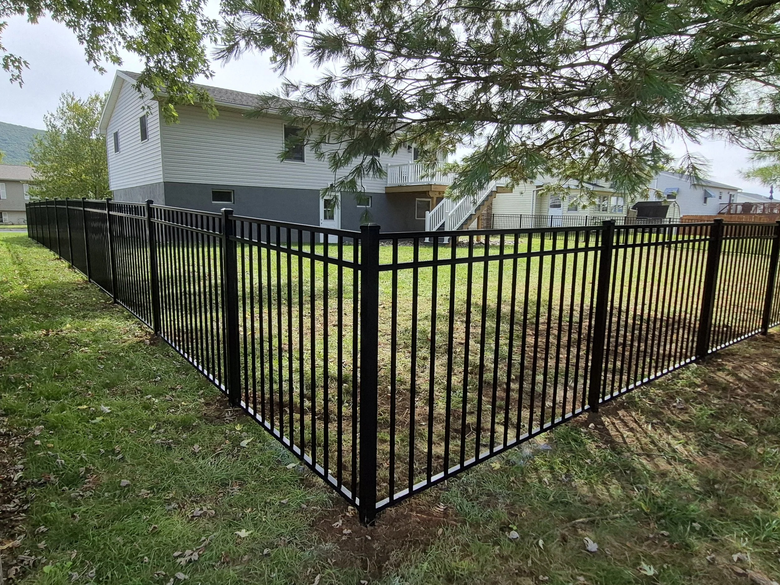 Aluminum Fencing installation in backyard