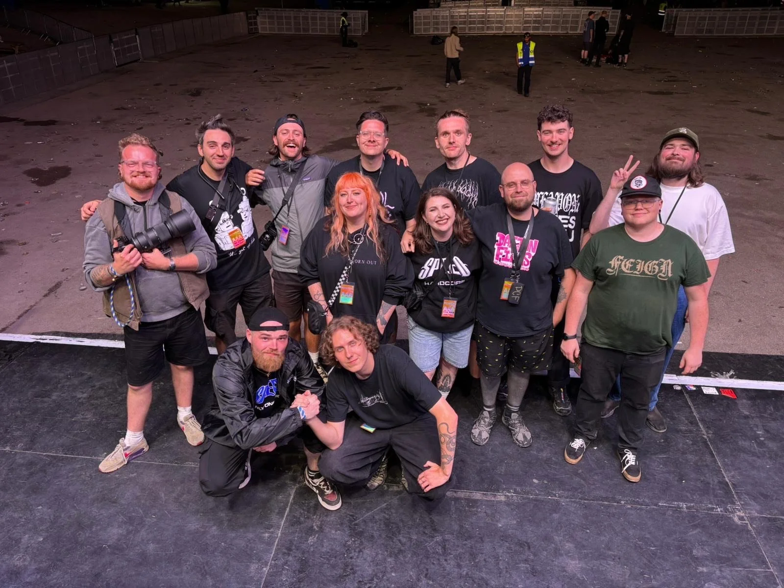 Outbreak Festival 2025 video and audio crew standing onstage.