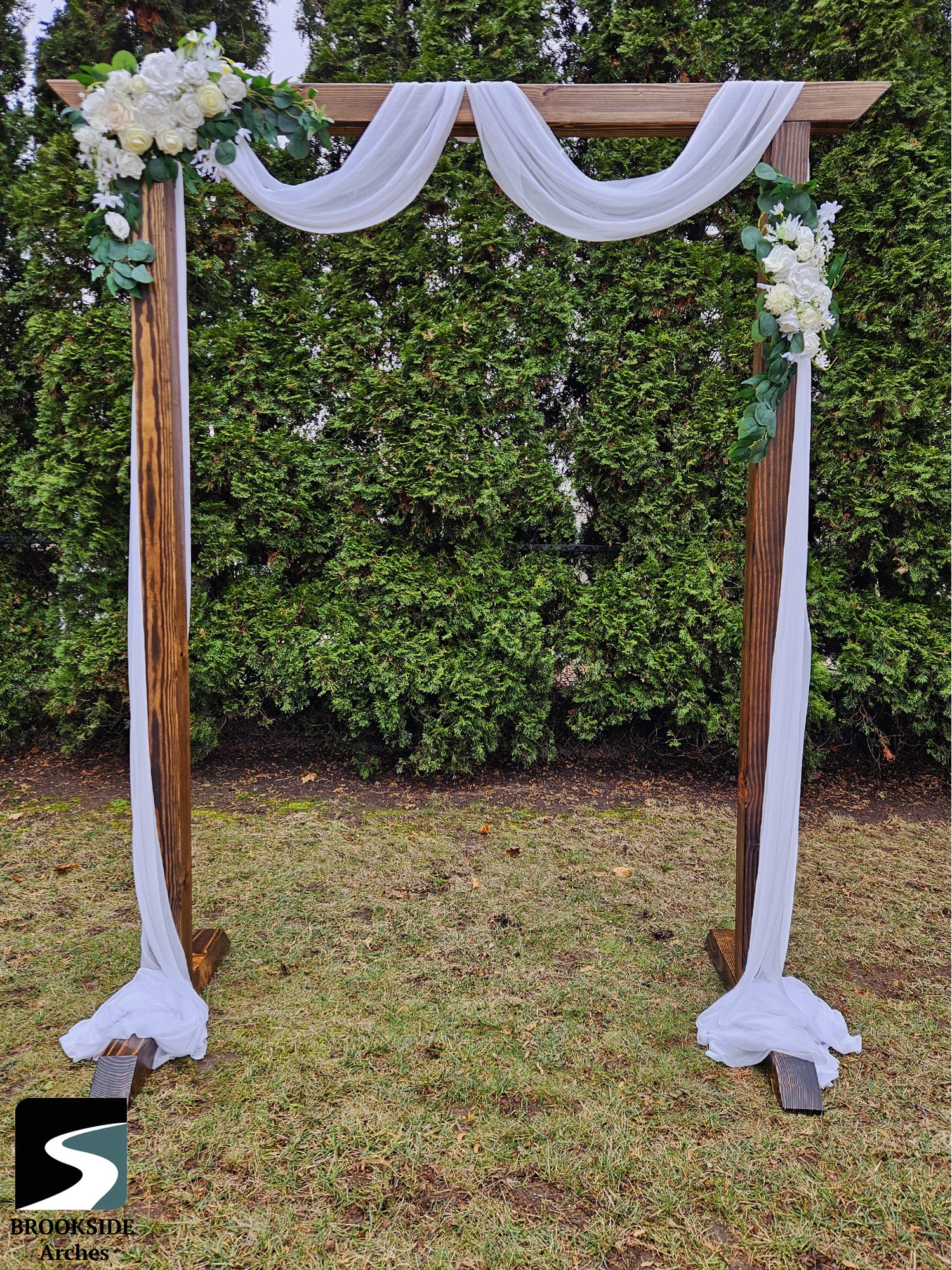 LOGO Small Arch With Drapery and Floral.jpg