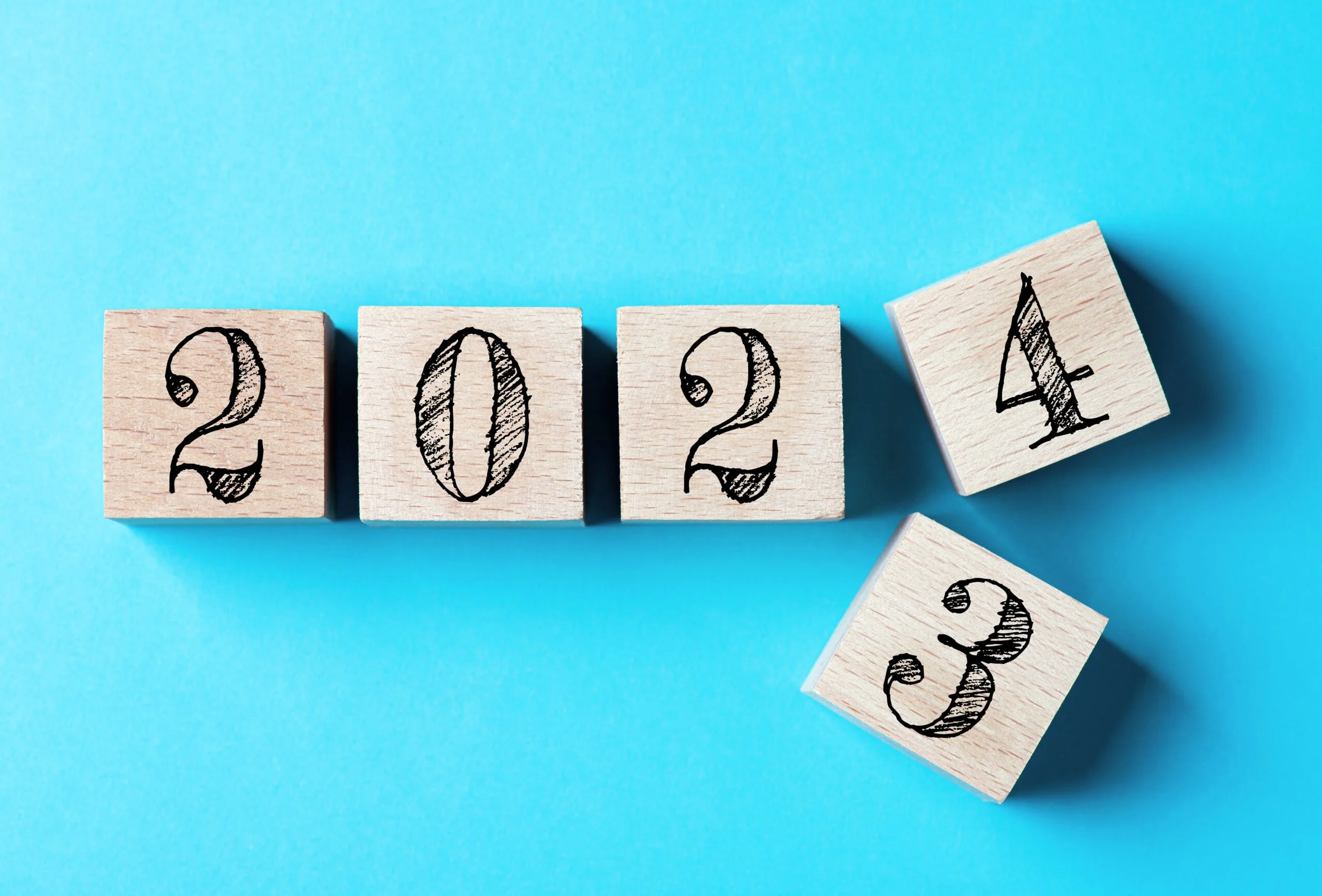 Wooden cubes that spell out 2024.