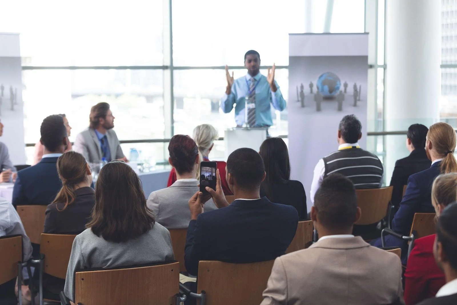 A team of professionals attending a presentation.