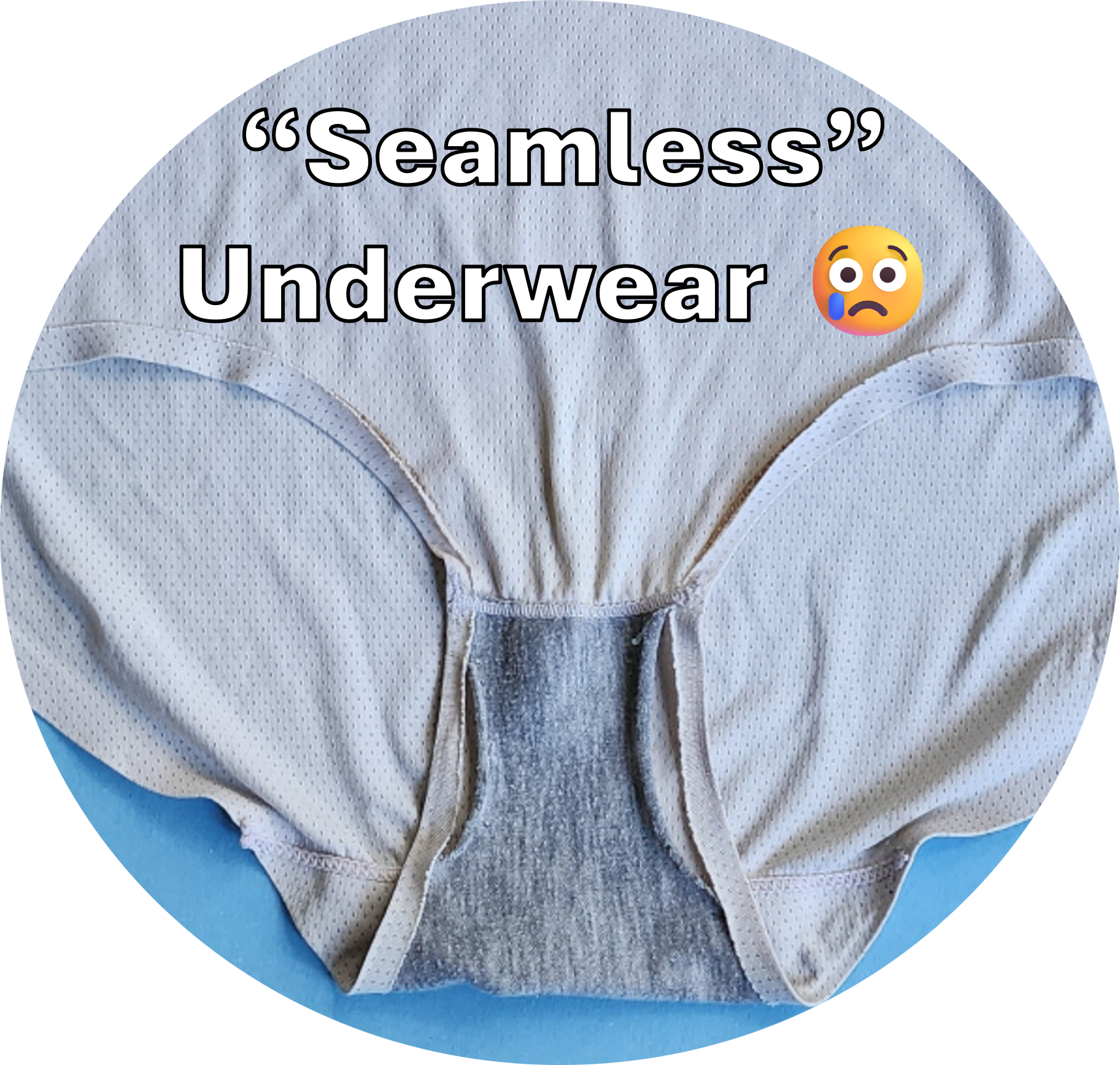 A pair of seamless underwear laid flat on a blue surface with text overlay that reads "Seamless" Underwear and an emoji with a surprised face.
