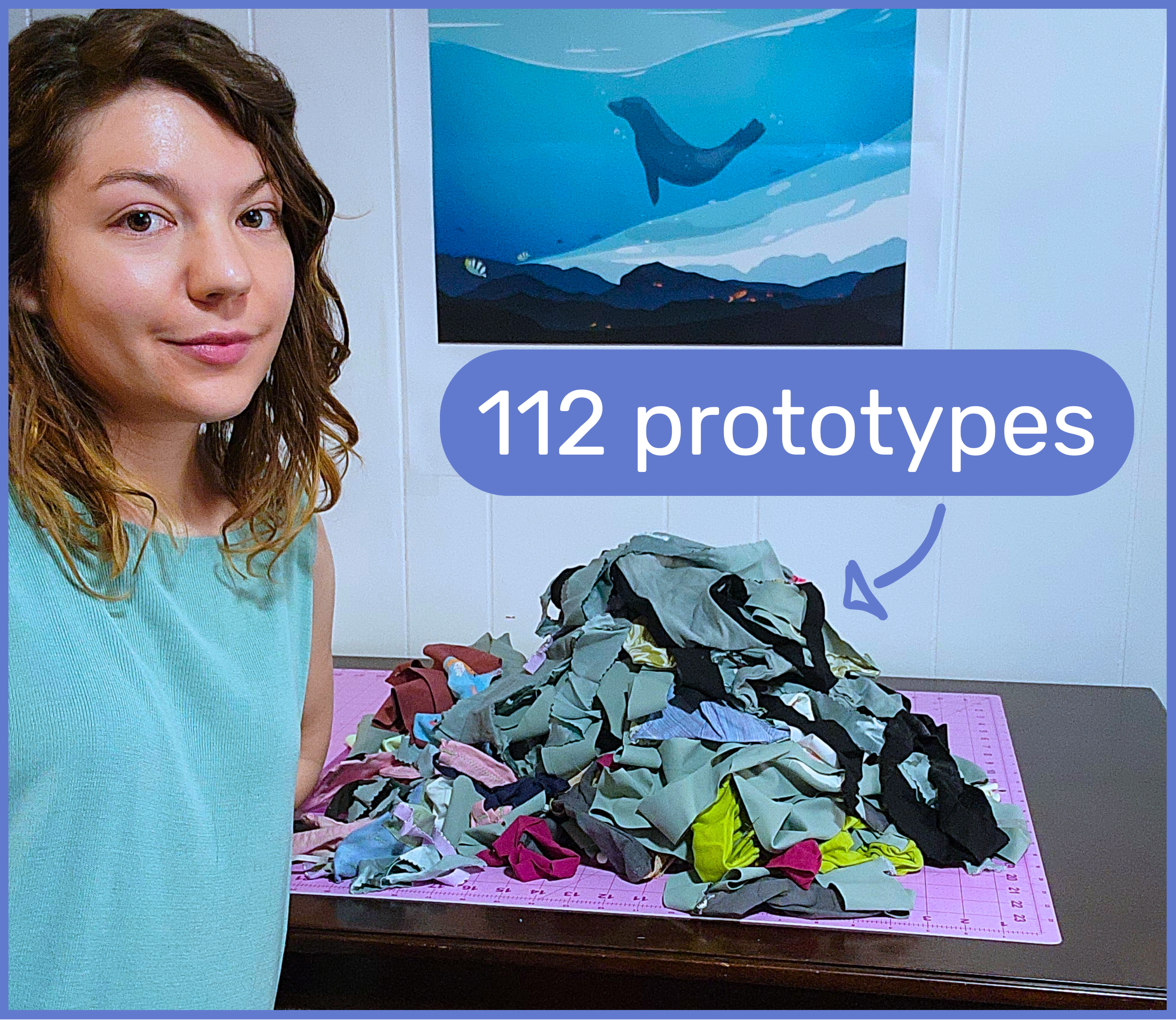 A woman stands next to a table with a pile of crumpled fabric or clothing. A label on the image reads '112 prototypes.' There is a poster of a whale and mountains hanging on the white wall behind her.