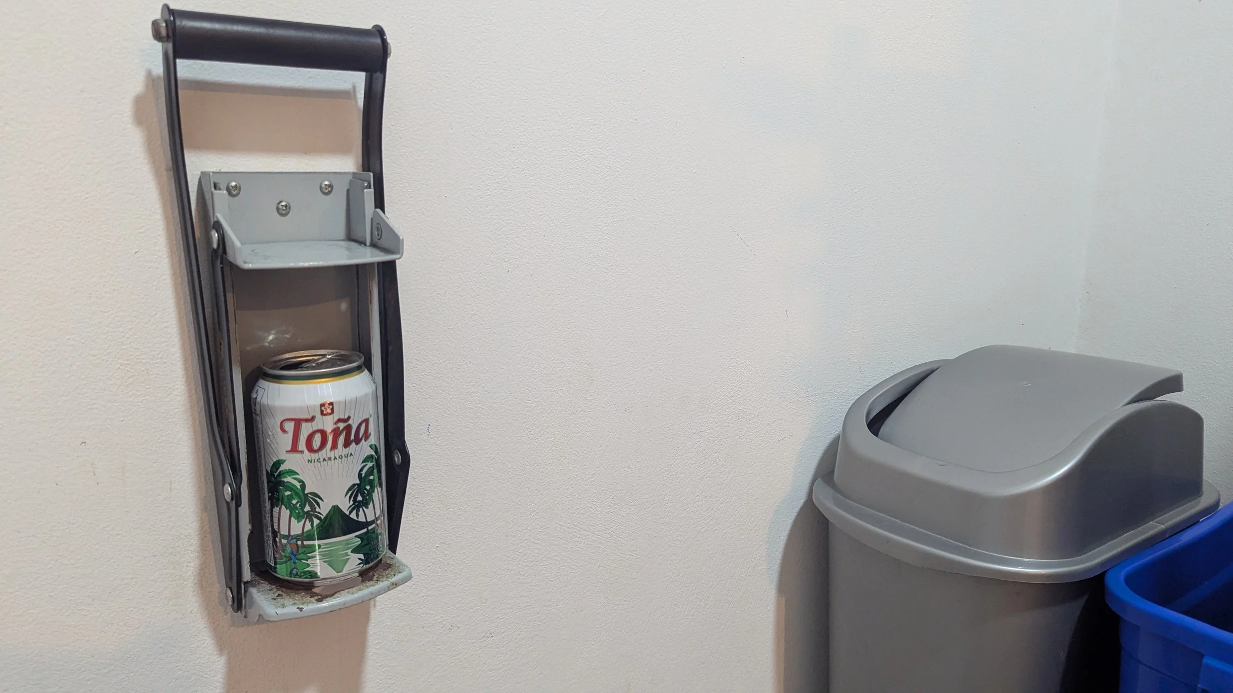 Corliss' Crusher has a big swing space, a collection bin and a blue bin for glass bottles