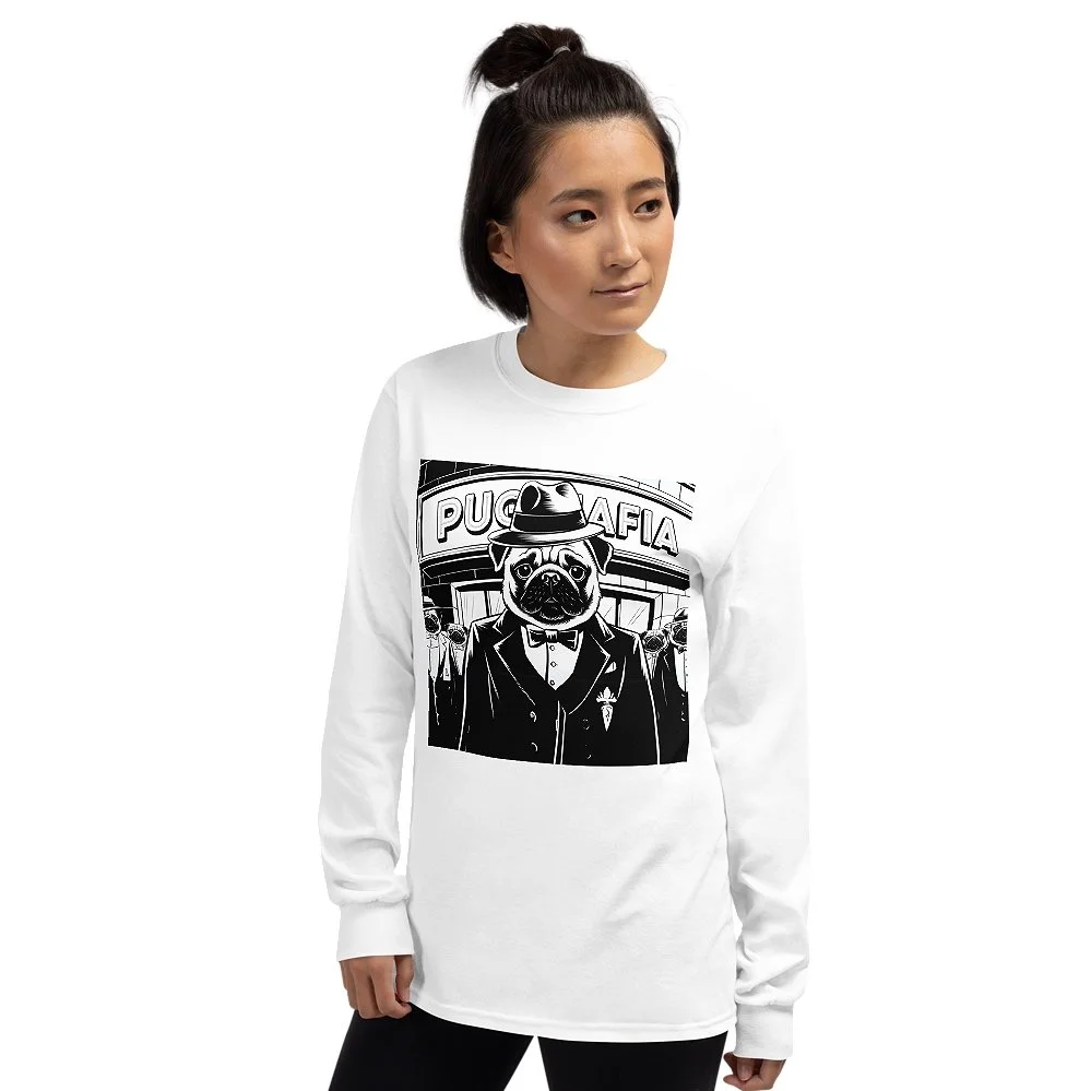 Woman wearing a white long sleeve shirt with a graphic of a pug dressed as a mafia boss.