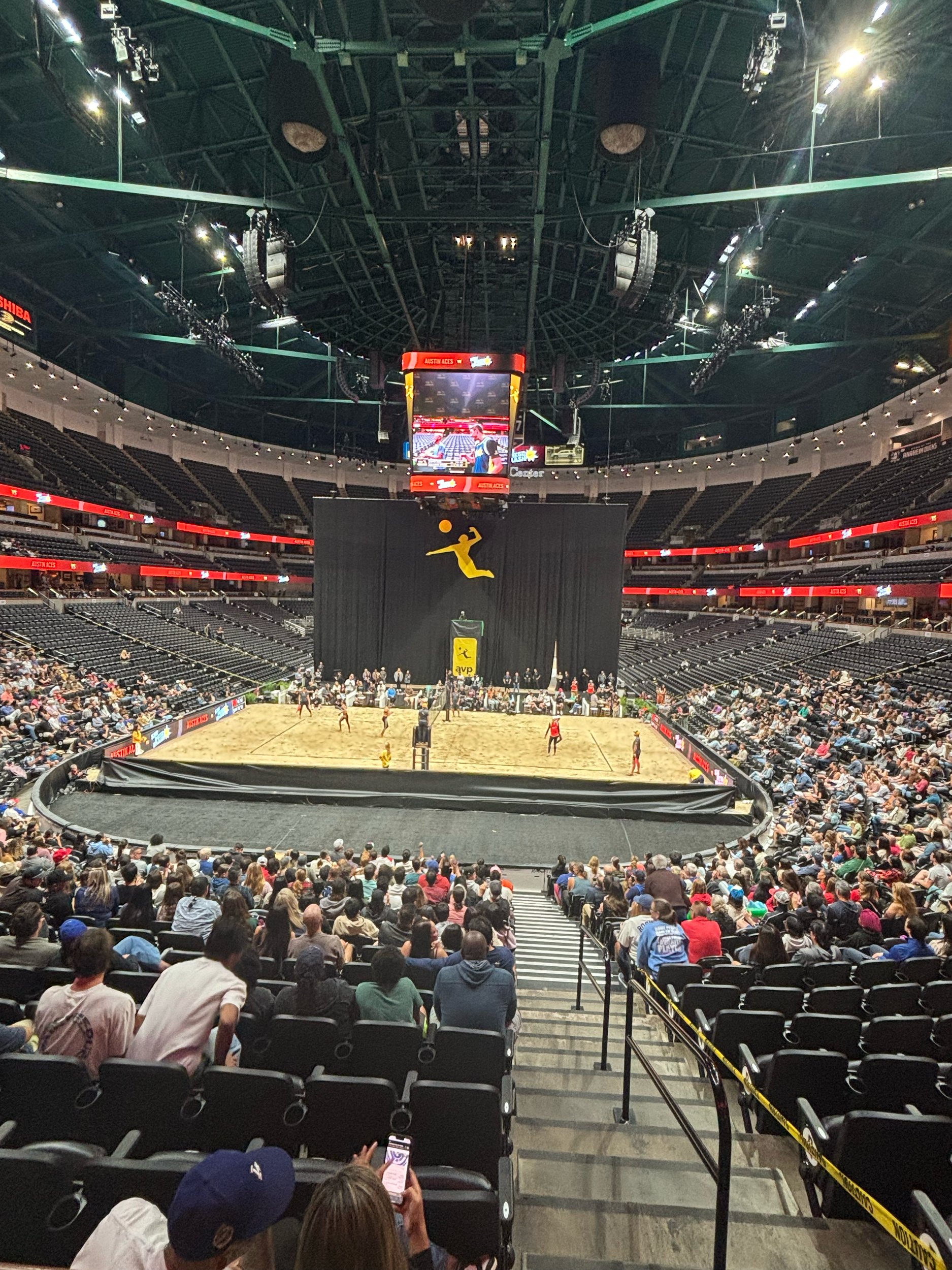 AVP sand court and crowd inside a large indoor arena