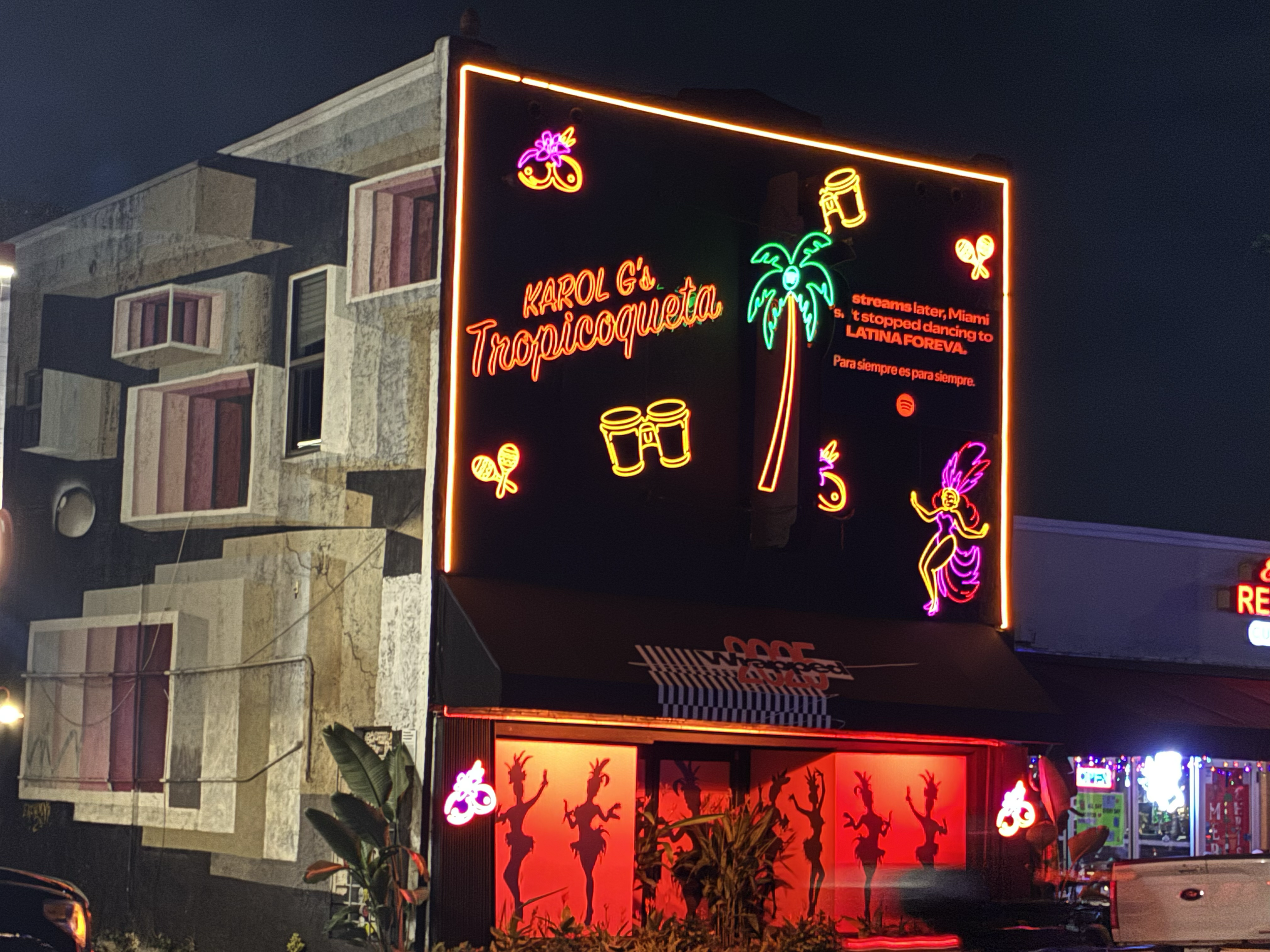 Nighttime view of the Spotify x Karol G installation