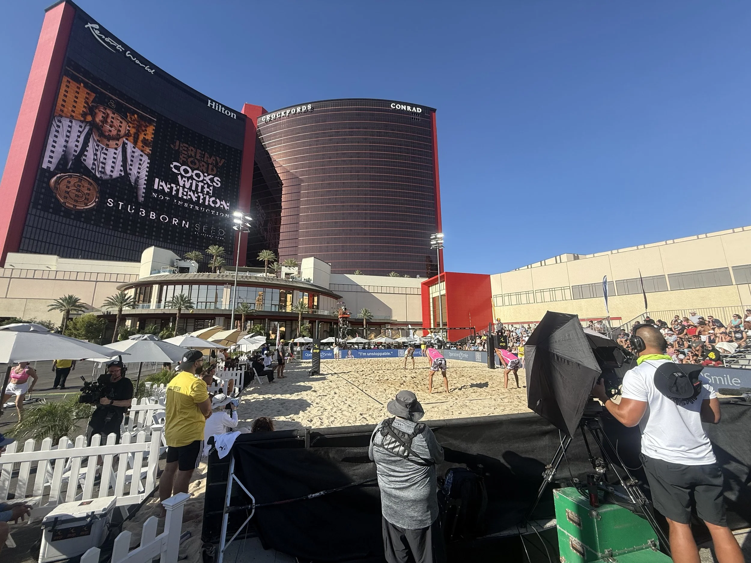 AVP event seating and court beside an outdoor venue
