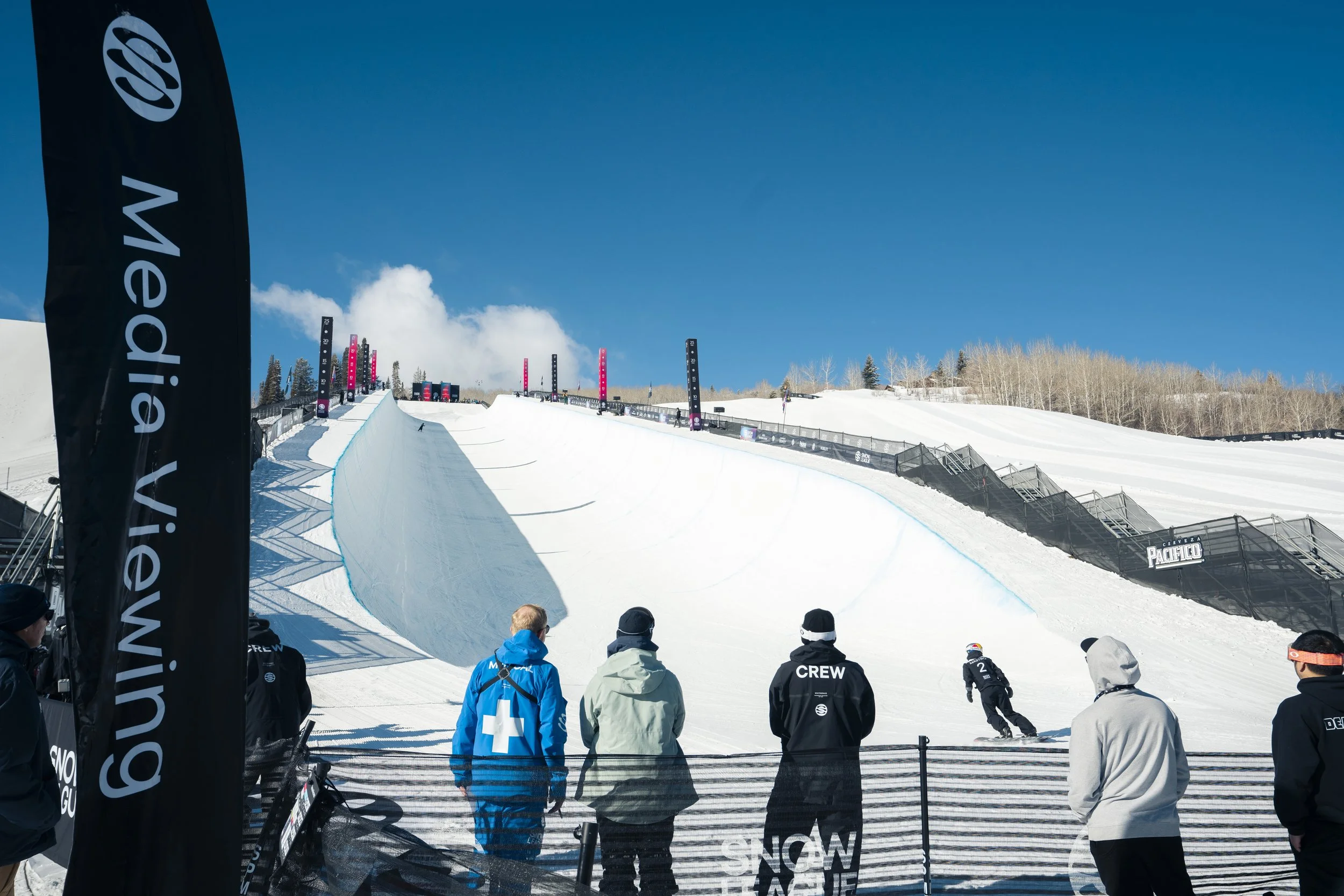 Snow-covered competition course and event signage