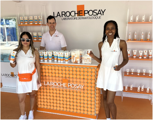 Visitors at the La Roche-Posay sunscreen sampling counter at the U.S. Open.