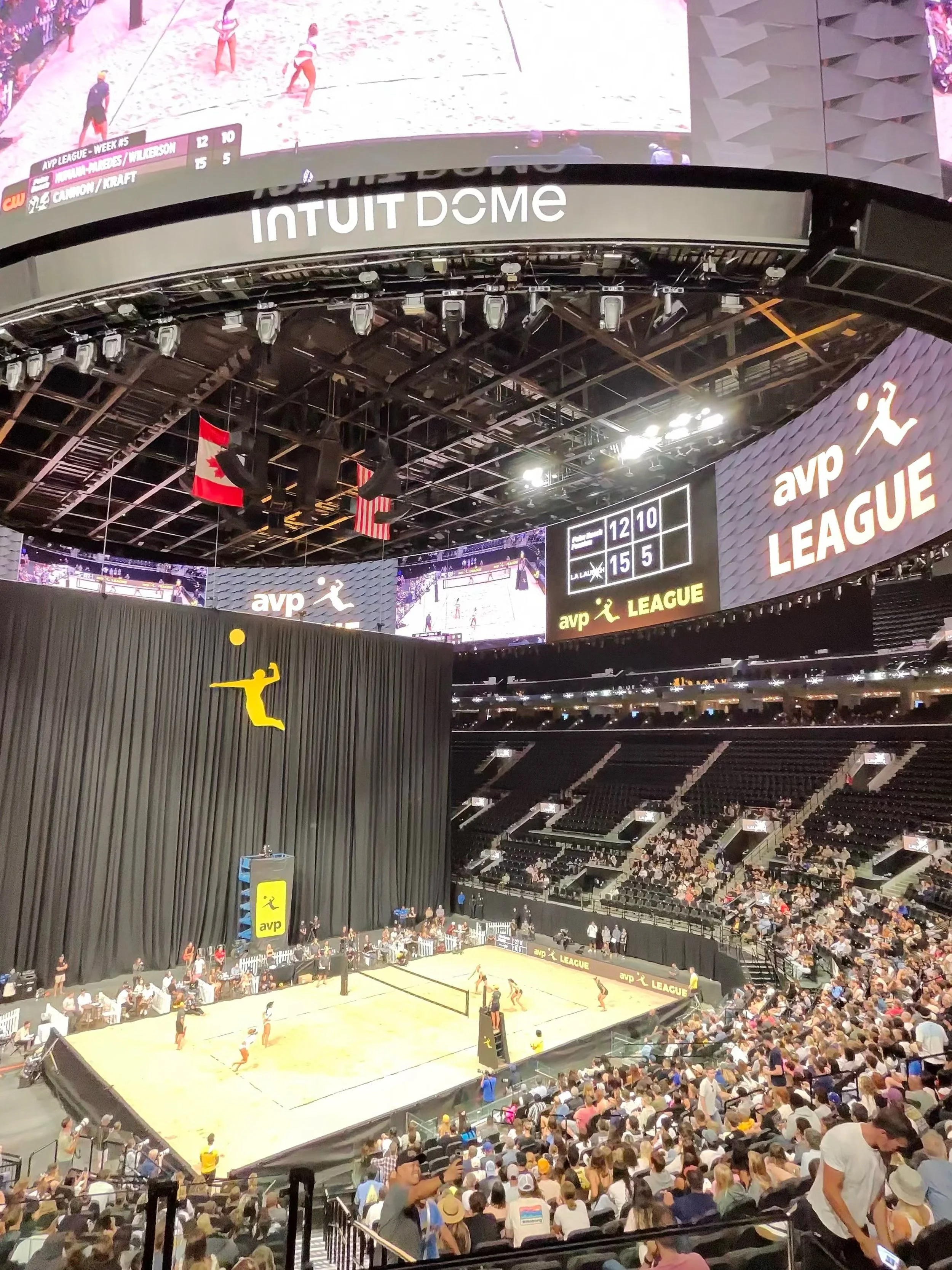 AVP League court and overhead event branding inside an arena