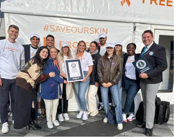 La Roche-Posay SOS Day team celebrating a Guinness World Records achievement.