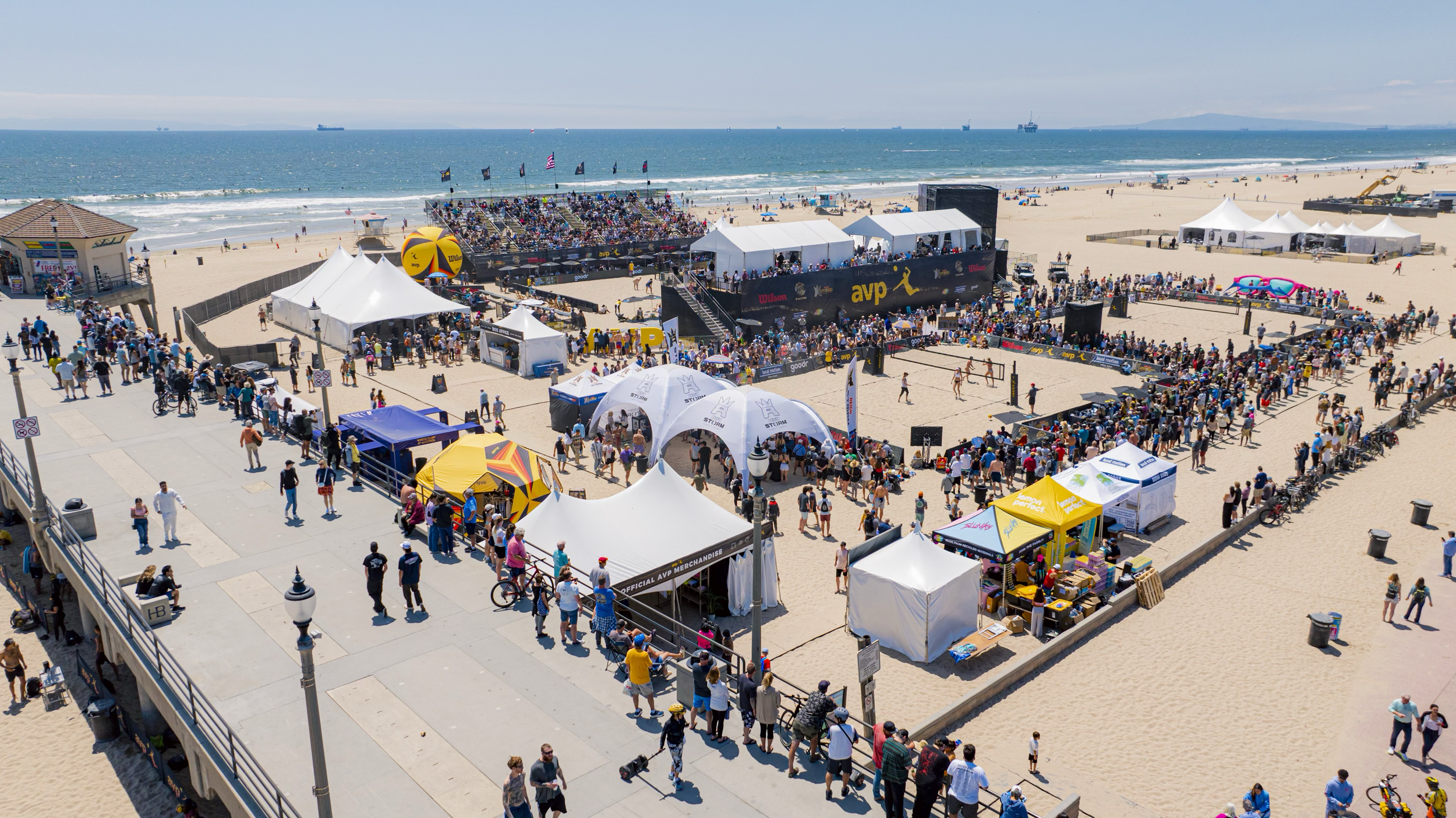 Beach volleyball event footprint with courts, tents, and sponsor areas