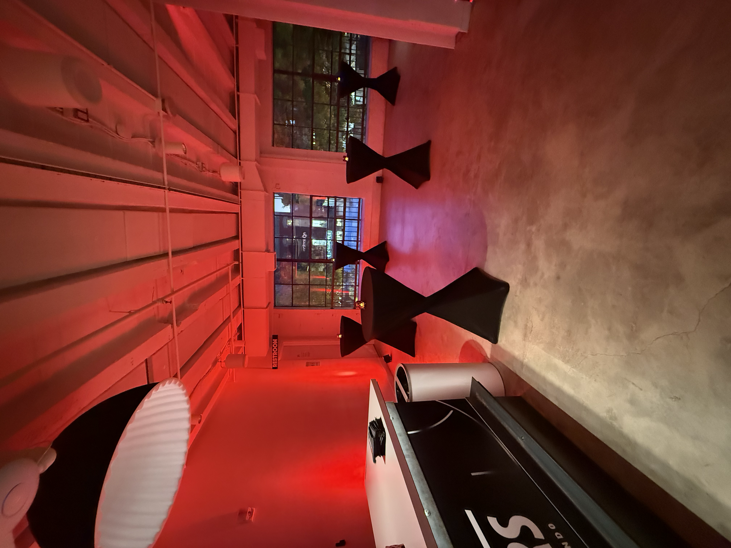 Event lighting and branded setup in the reception area
