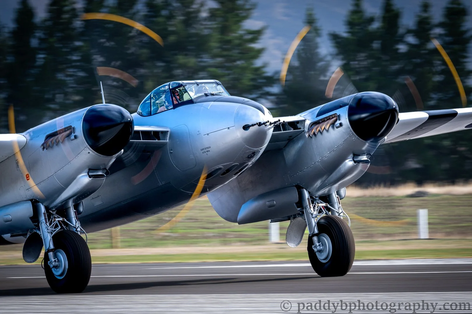 DeHavilland DH.98 Mosquito T.43 NZ2308 on the take-off roll with a smiling Steve Hinton at the controls during Warbirds over Wanaka 2024