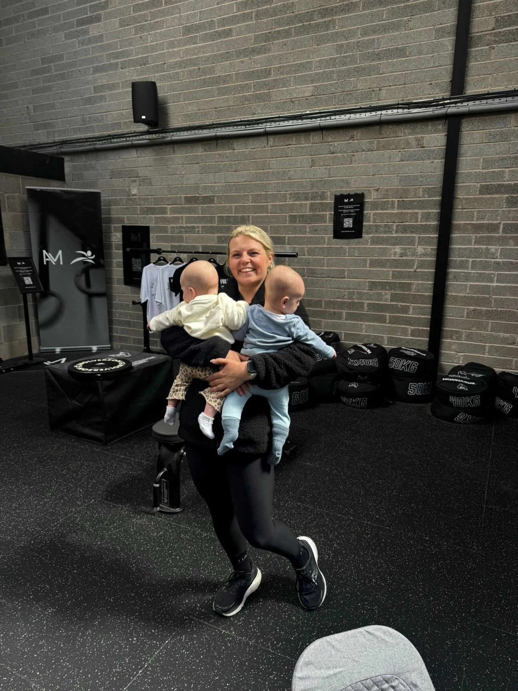 Sometimes coaching means counting reps. Sometimes it means cuddling babies so mum can finish her set. Either way, we&rsquo;ve got you. 🍼💪
