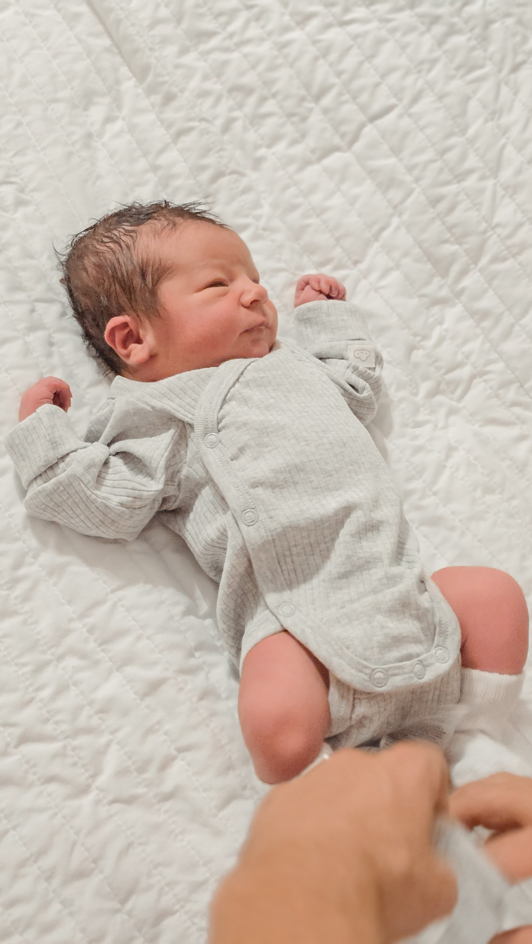 Newborn baby after delivery with a birth doula
