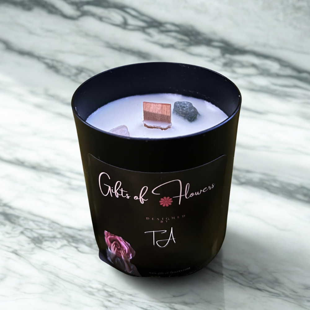 candle in black tin container, wood wick, and Gifts of Flowers designed b TA packaging label