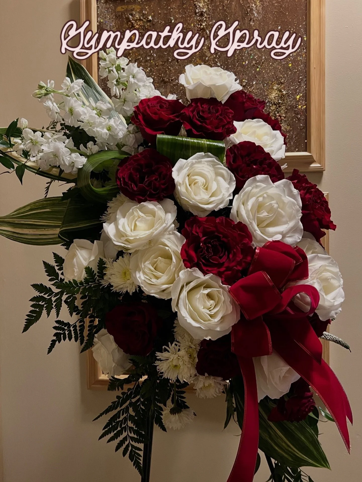 Request: Simple-Demure and Understated, Pretty. Only Red and White Roses a few Sprinkles of Fillers. &ldquo;That&rsquo;s how she lived her life, elegant, quite, no frills, and pretty.&rdquo;