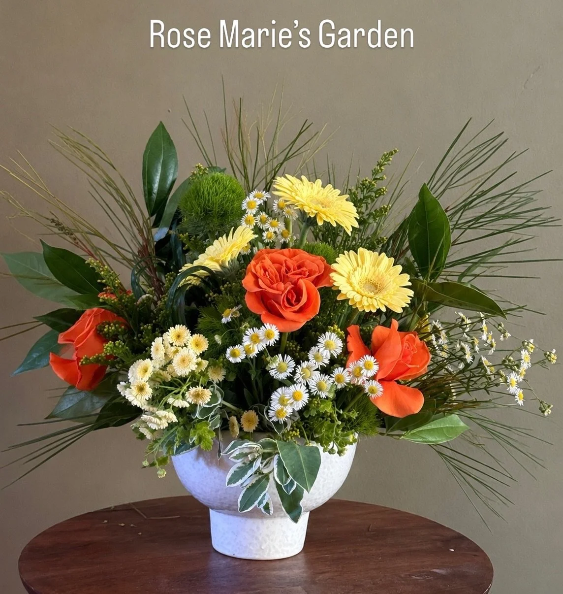 A birthday surprise for Rose Marie. Sent with love from a dear friend in Minnesota and designed with touches of lush green inspired by her love of Ireland.

Every arrangement we create begins with a story.

Gifts of Flowers designed by TA

Serving Ma