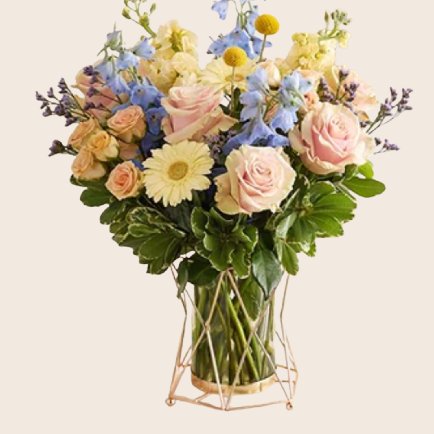 Pastel Garden Harmony arrangement featuring blush roses and blue delphinium designed by Gifts of Flowers Designed by TA.