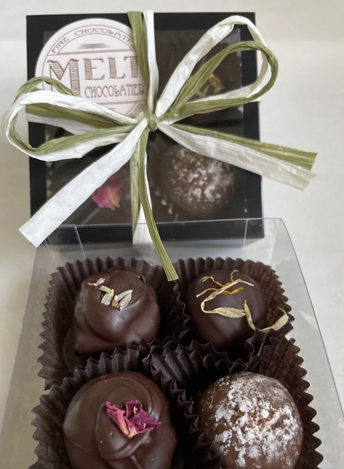 Box of four handcrafted assorted chocolate truffles by Melt Chocolatier