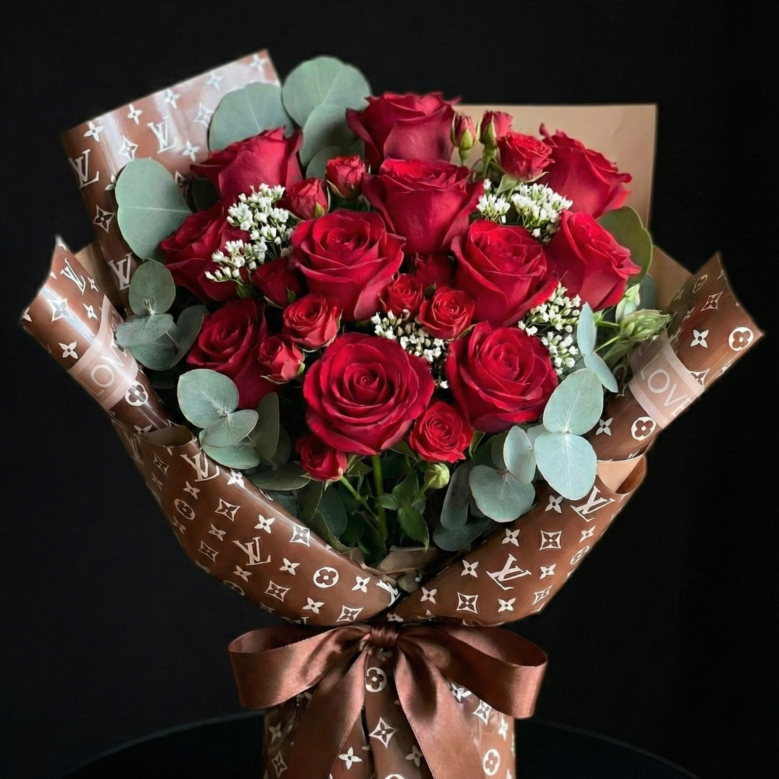 Red rose Valentine bouquet with eucalyptus and couture-inspired wrapping by Gifts of Flowers Designed by TA