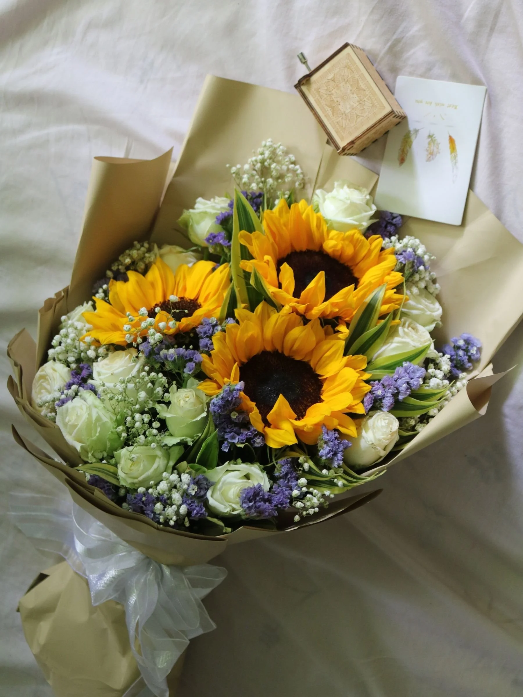 sunflower-on-bed-bouquet.jpg