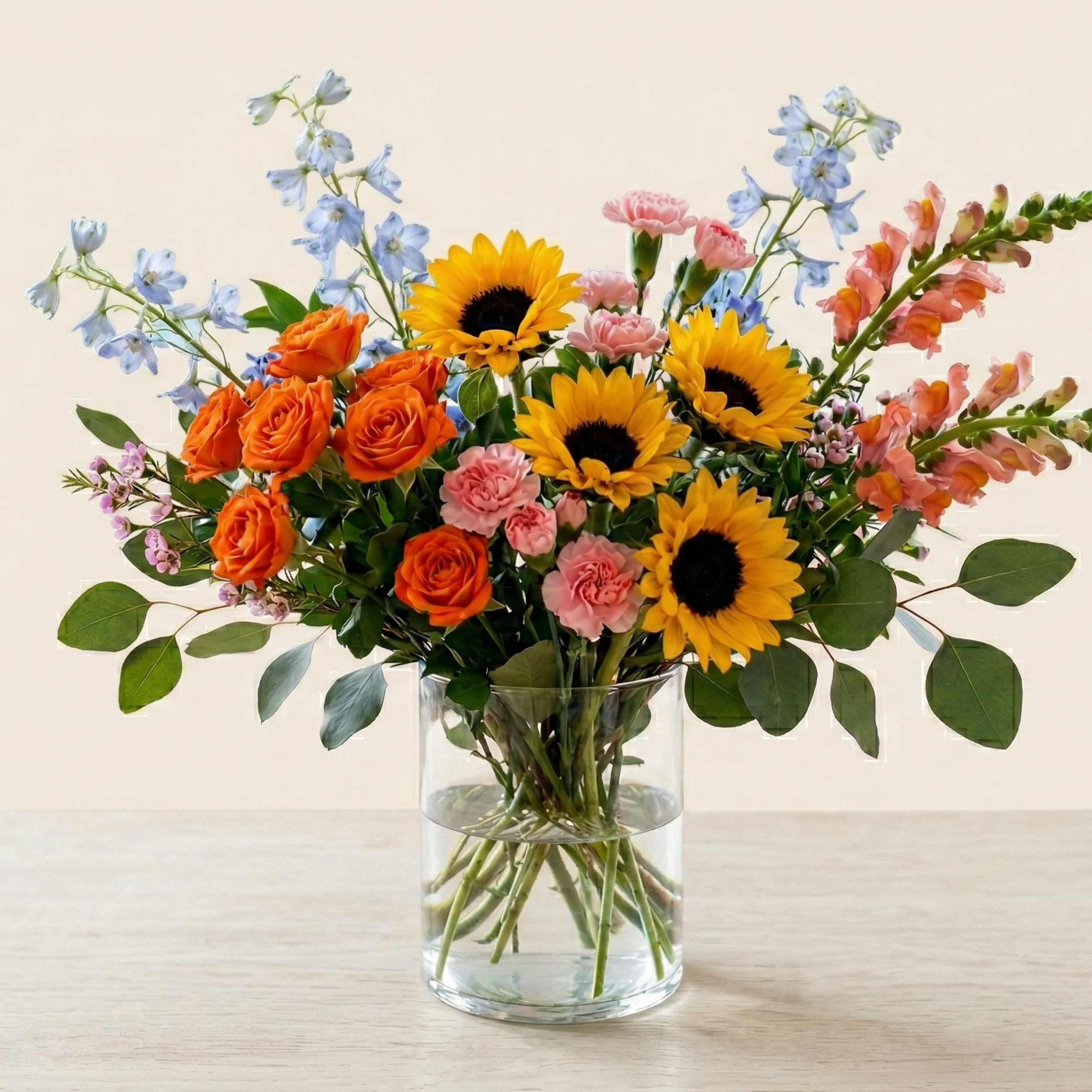 sunflowers with orange roses pink carnations plus