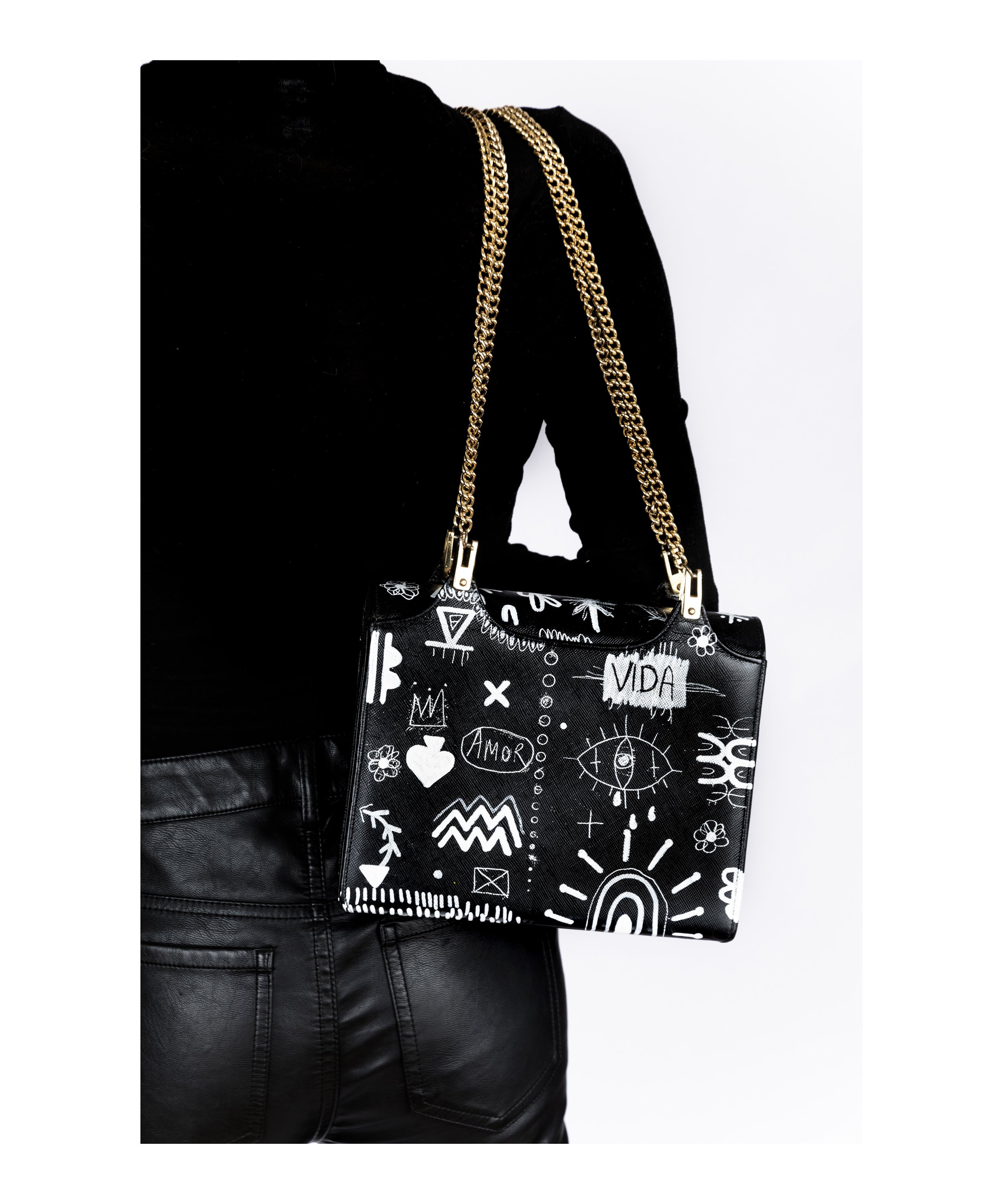 Artistic hand-painted vintage purse in bold symbols by arist Javiera X Estrada